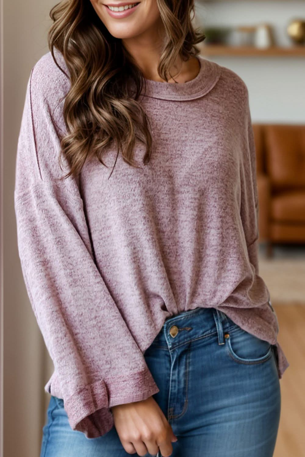 Chic high-low sheer long sleeve top with exposed seams