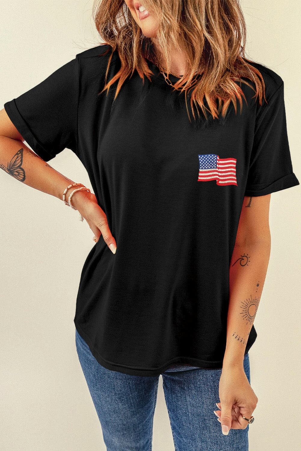 US flag short sleeve tee with comfy fit, featuring bold design on black fabric.