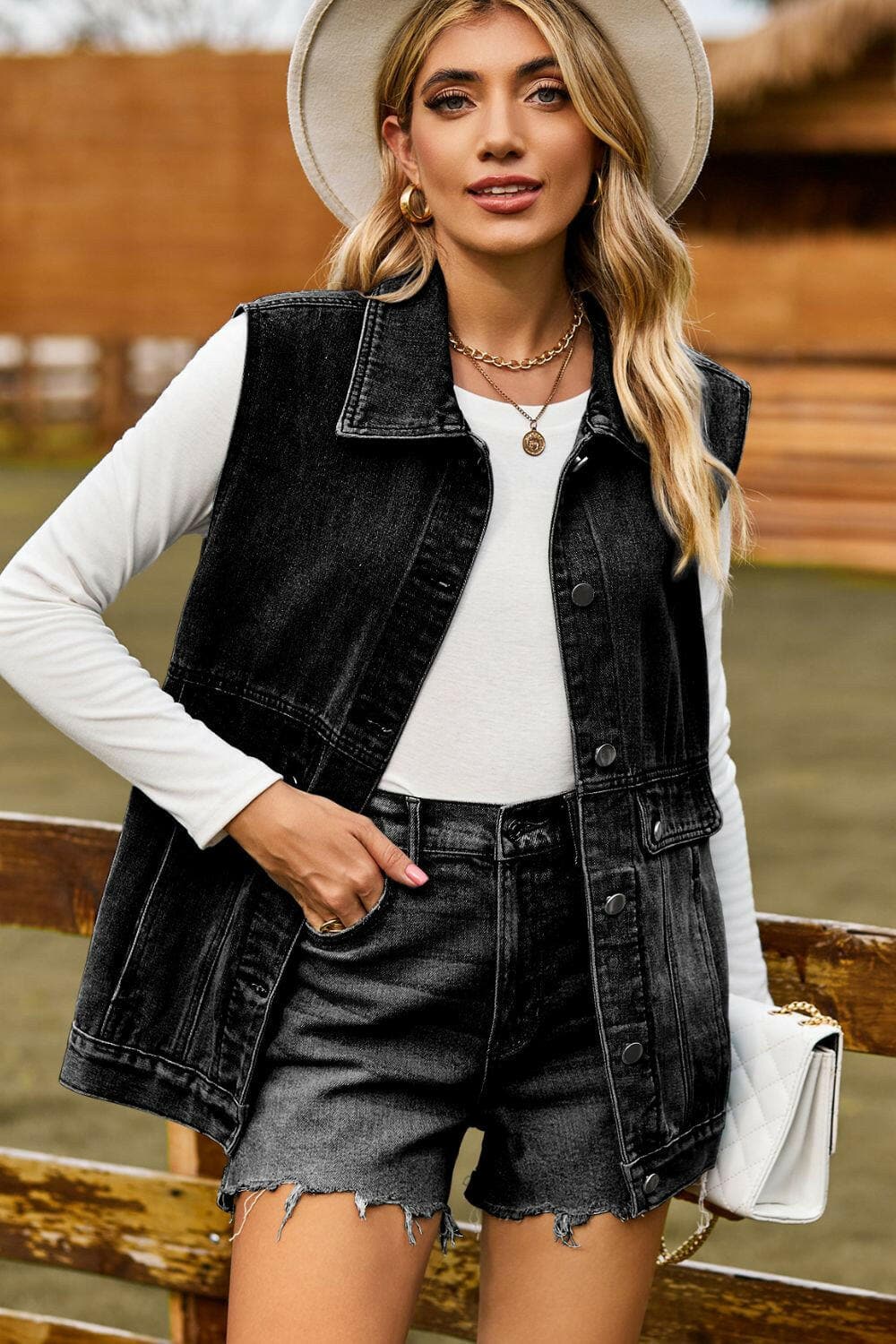 Sleeveless Collared Neck Denim Top with Pockets.