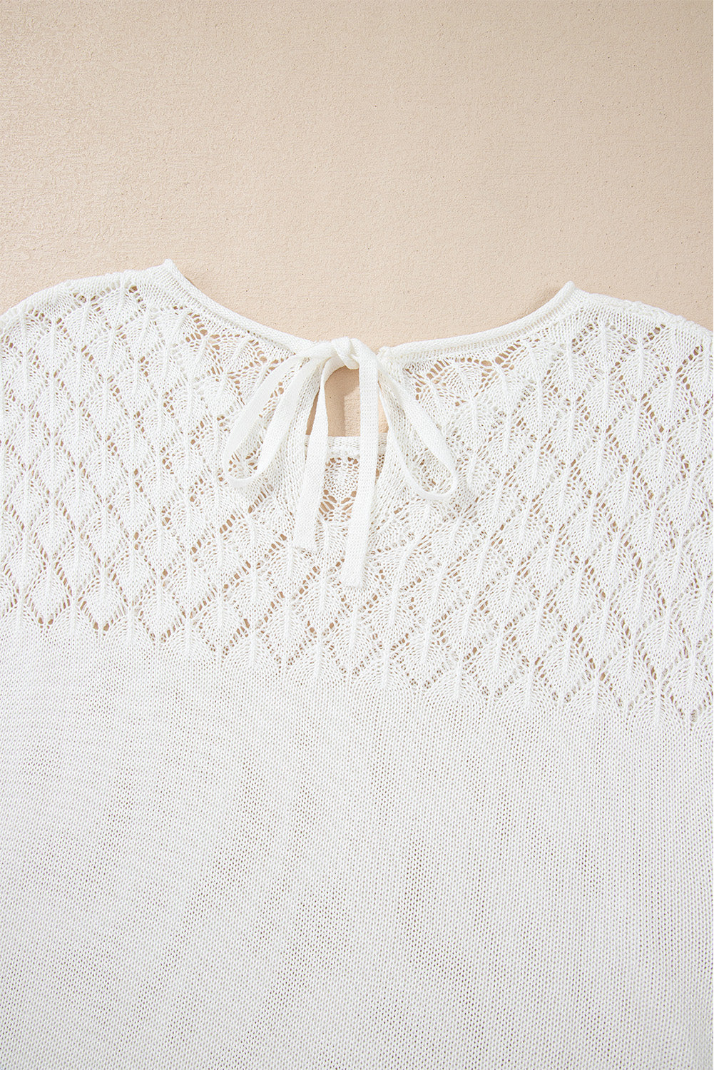 Elegant White Eyelet Knit Short Sleeve Sweater with Tied Back Detail