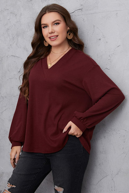 Melo Apparel Plus Size V-Neck Dropped Shoulder Blouse.