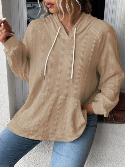 Cozy pocketed sheer hoodie with drawstring and long sleeves