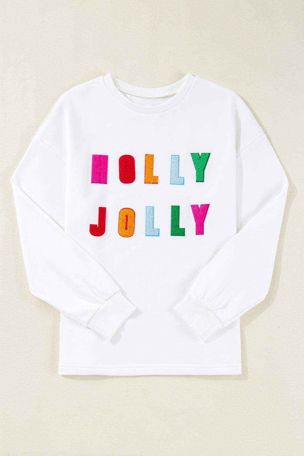 Celebrate in style with the cozy holiday graphic long sleeve top