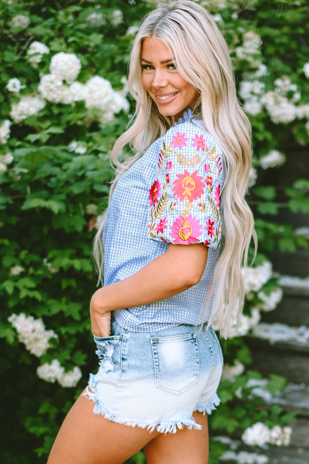 Light blue floral embroidered blouse with puff sleeves and gingham pattern