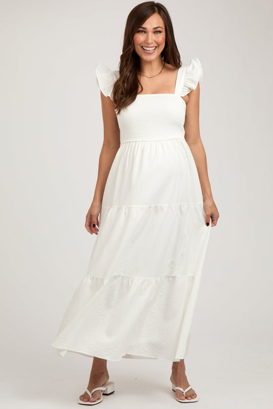 PinkBlush cream sleeveless smocked tiered maternity maxi dress front view