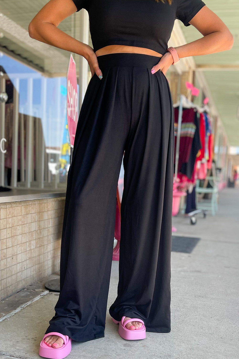 Chic black crop top and wide leg pants ensemble