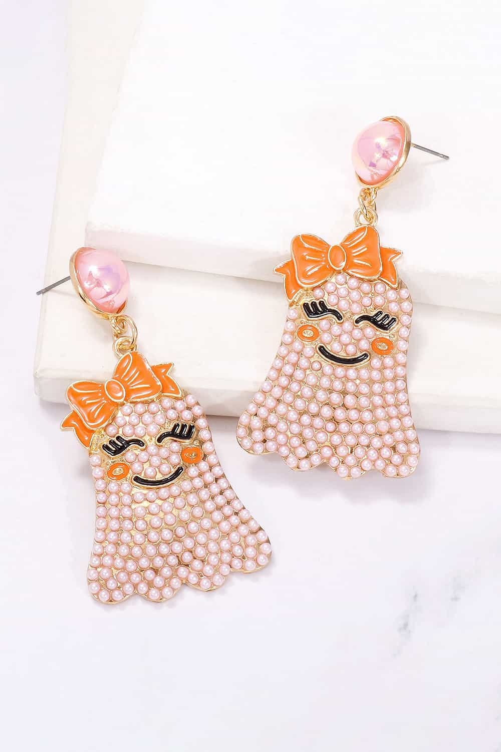 Charming ghost earrings with pearls