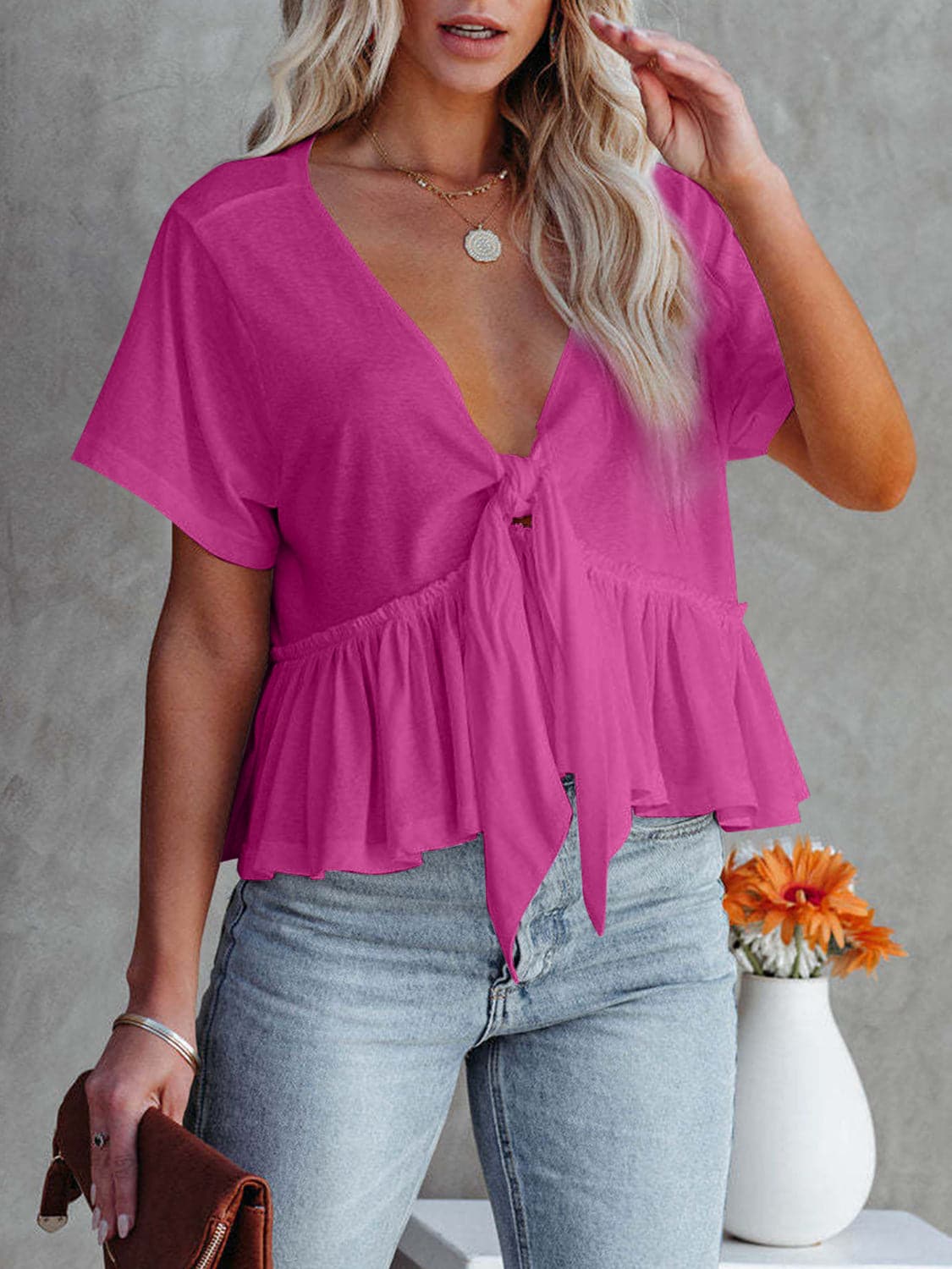 Tied Plunge Short Sleeve Blouse.