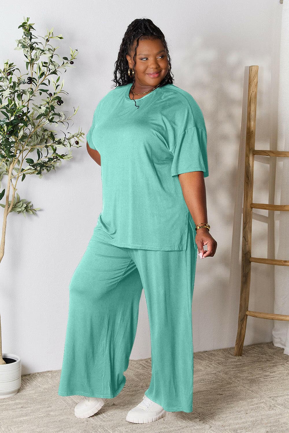 Double Take Full Size Round Neck Slit Top and Pants SetUpgrade Your Style with the Double Take Set
 Step into sophistication with our Double Take Full Size Round Neck Slit Top and Pants Set. This chic and versatile two-pLove Salve Full Size Round Neck Slit Topusa