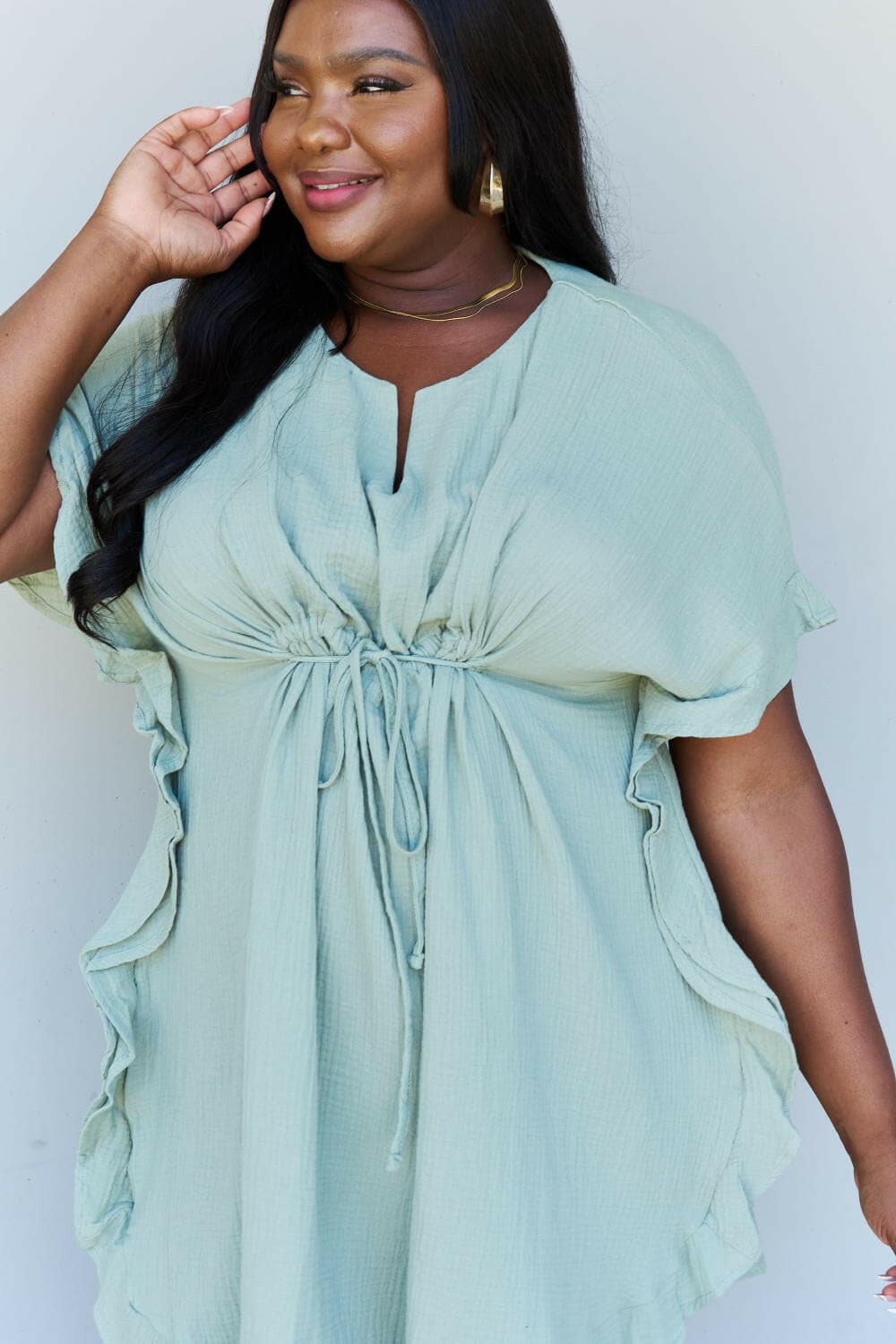 Ninexis Out Of Time Full Size Ruffle Hem Dress with Drawstring WaistbaExperience Effortless Elegance with the Ninexis Out Of Time Full Size Ruffle Hem Dress in Light Sage. This stunning dress is crafted from 100% cotton, providing a soLove Salve Time Full Size Ruffle Hem DressTIKTOK