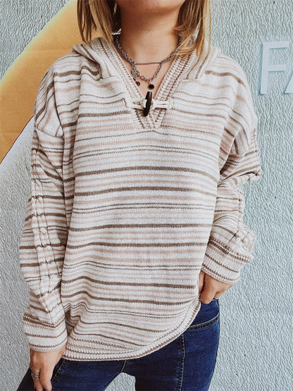 Cozy striped hooded sweater with buttoned details