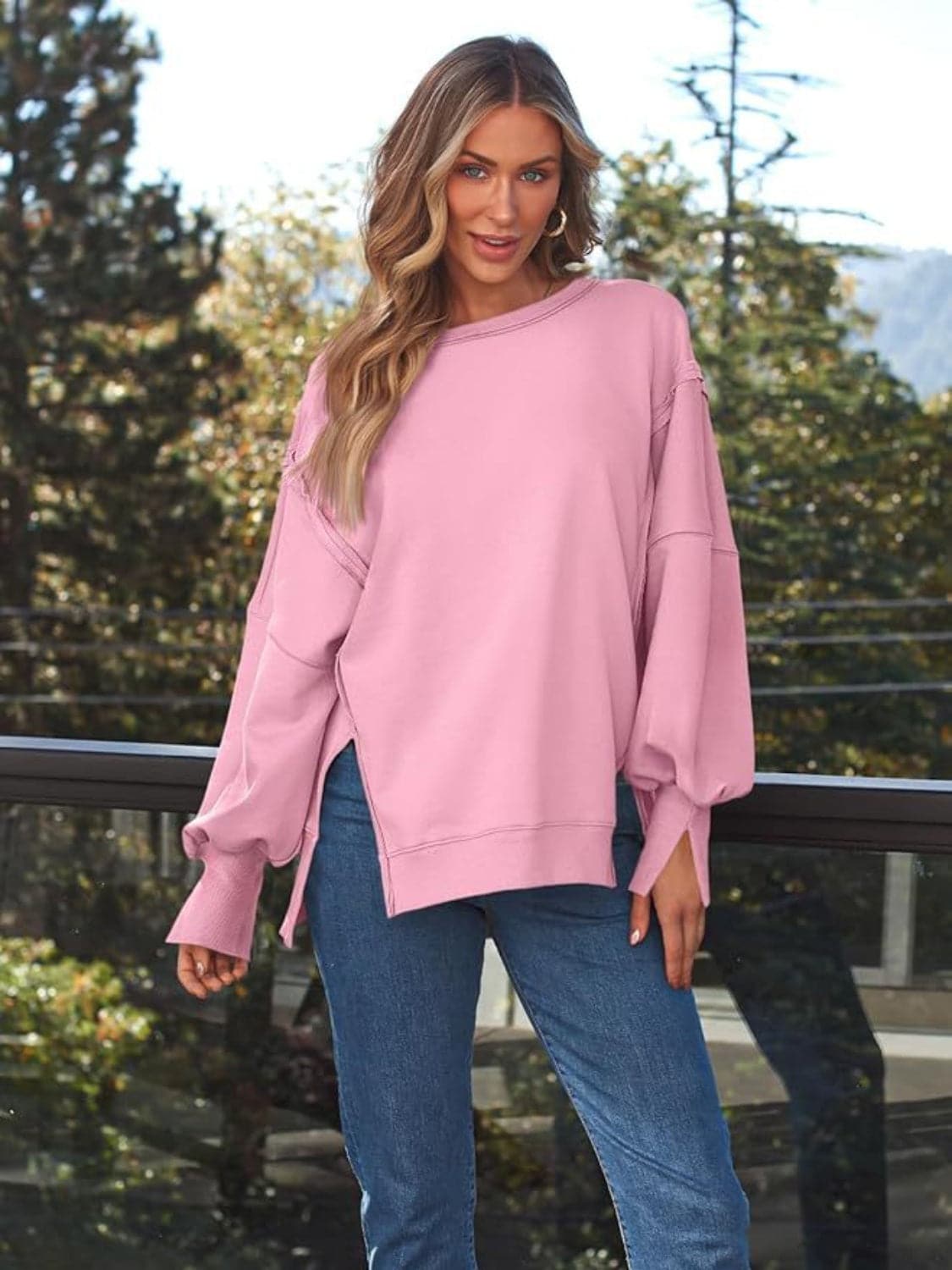 Slit Round Neck Long Sleeve Sweatshirt.