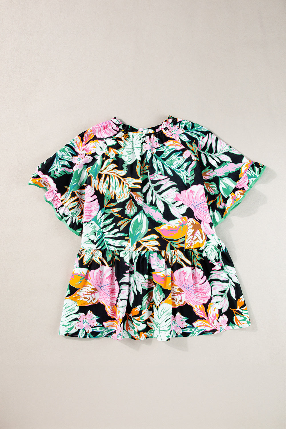 Elegant black tropical print blouse with ruffled sleeves and flowy design