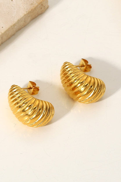 Seashell-inspired spiral stud earrings for elegant charm