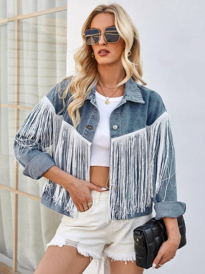 Boho tassel denim jacket with trendy tassel accents and drop sleeves.