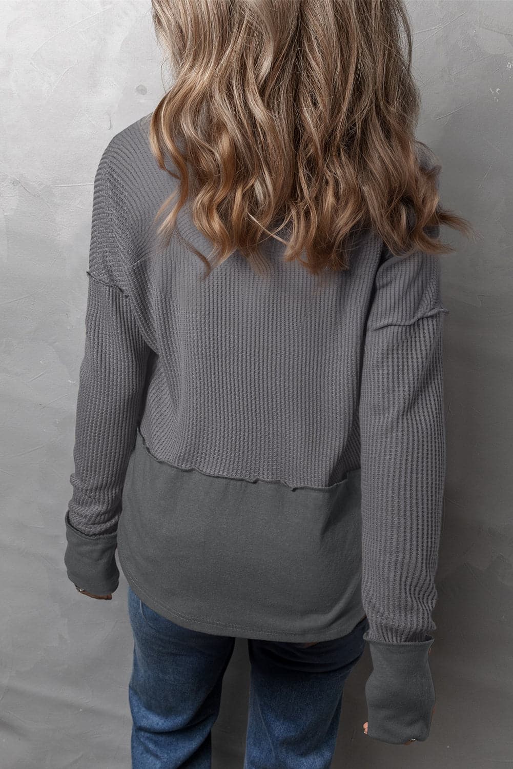 Waffle-Knit Exposed Seam Notched Long Sleeve Top.