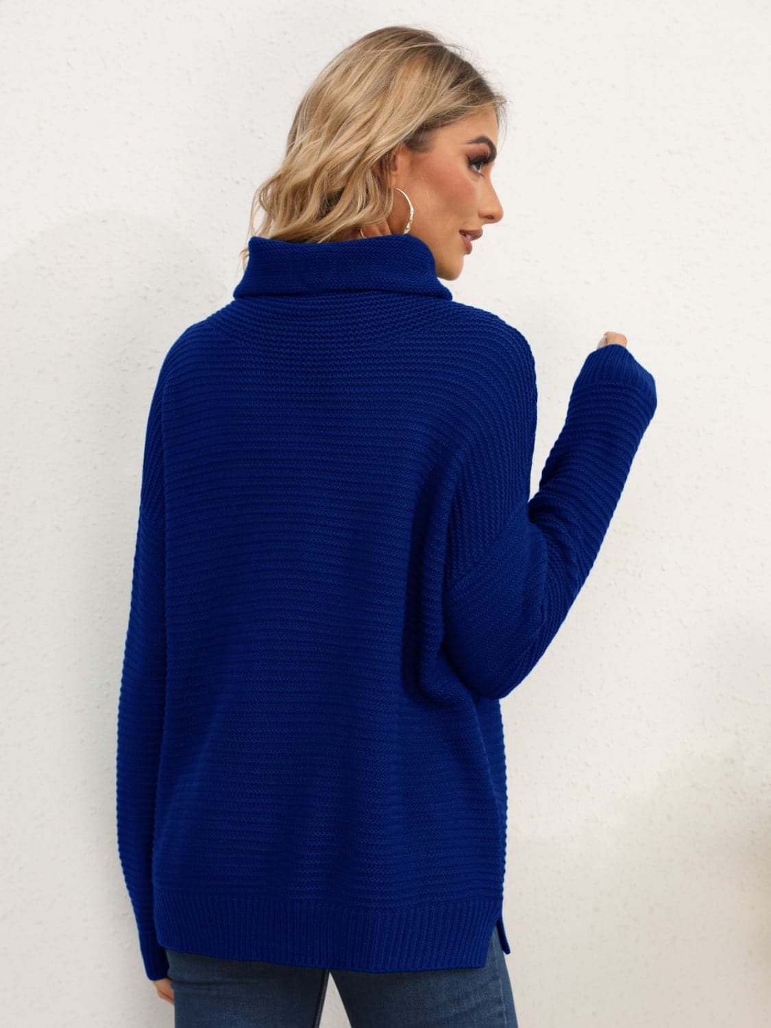 Slit Turtleneck Dropped Shoulder Sweater.