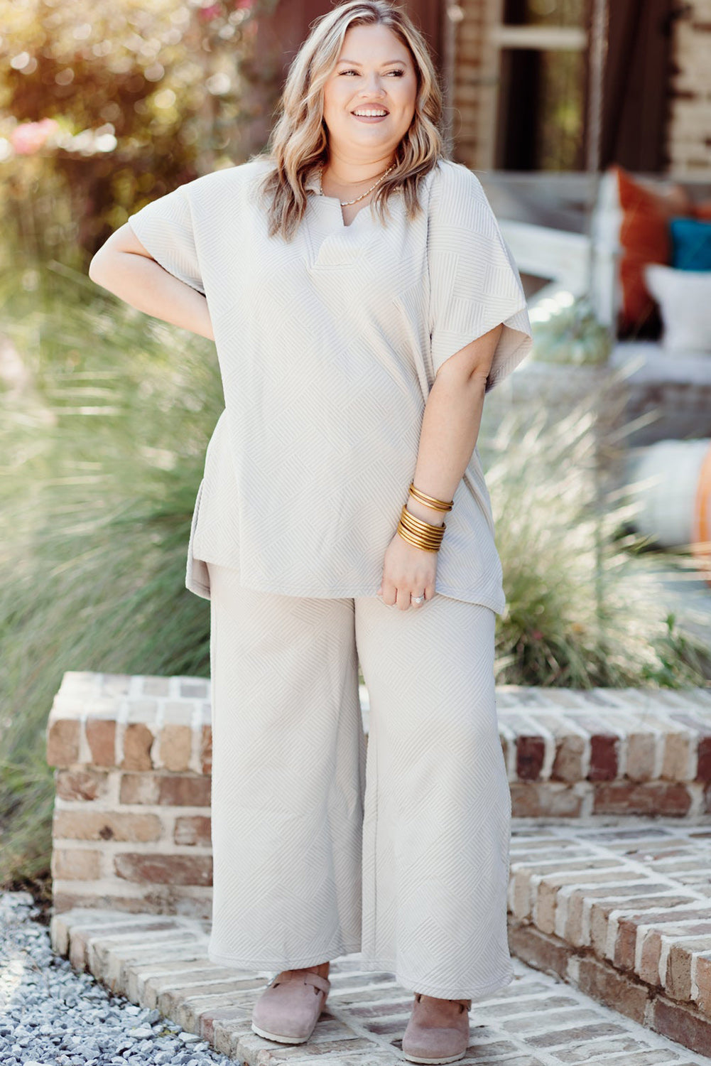 Chic beige plus size textured top and pants ensemble