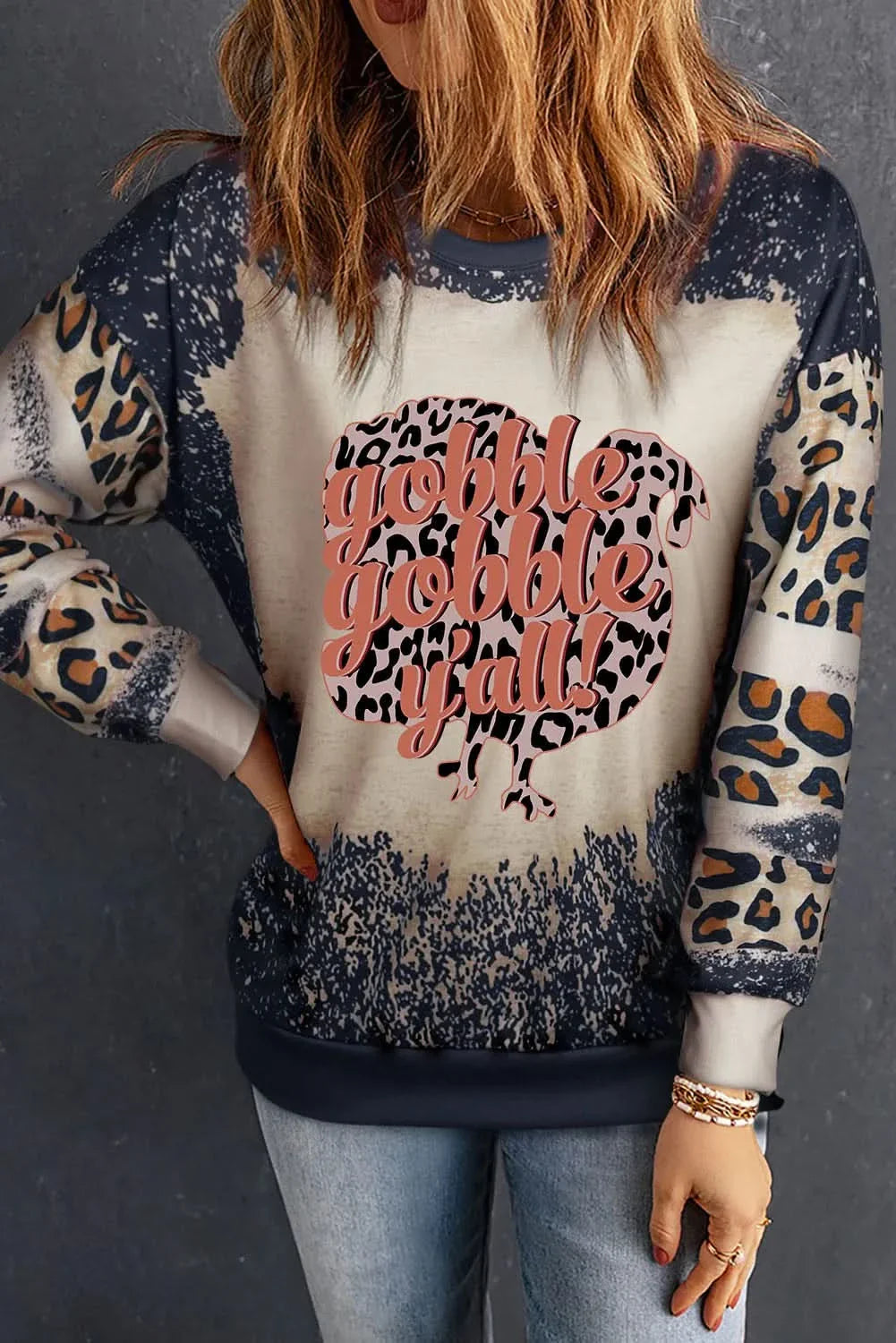 Leopard round neck long sleeve sweatshirt with graphic print and slightly stretchy material.