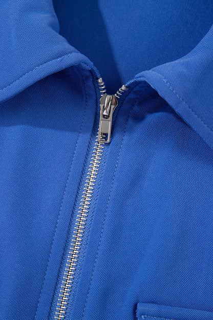 Dusk Blue Zip-Up Jacket with Tab Sleeves and Flap Detail