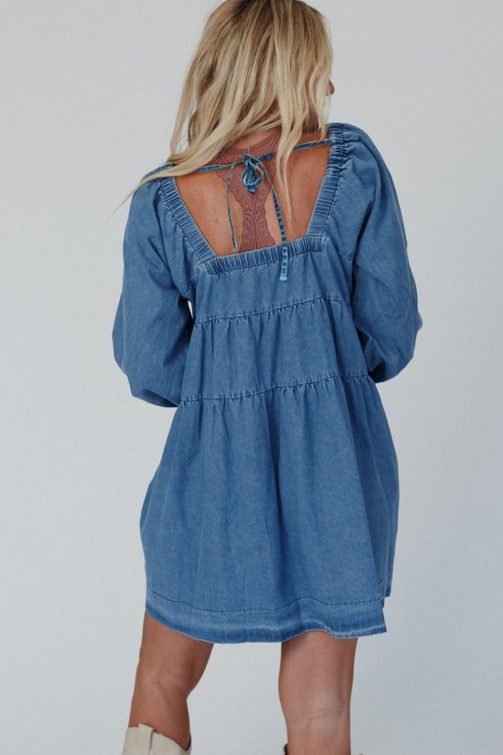 Dusk blue denim mini dress with square neckline and side pockets