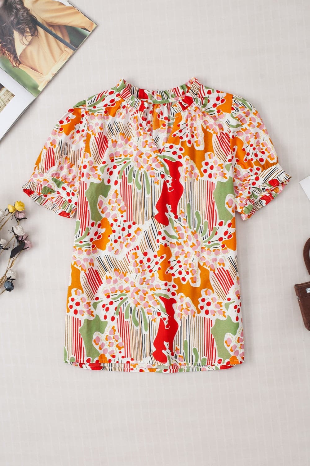 Printed Notched Short Sleeve Blouse.