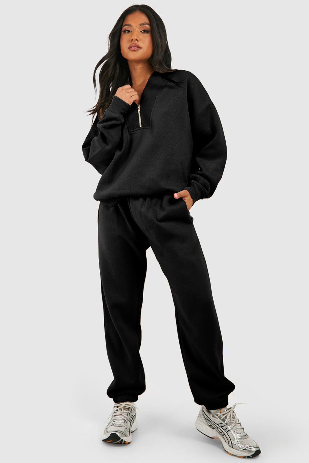 Chic black half zip tracksuit with ribbed edges for ultimate comfort