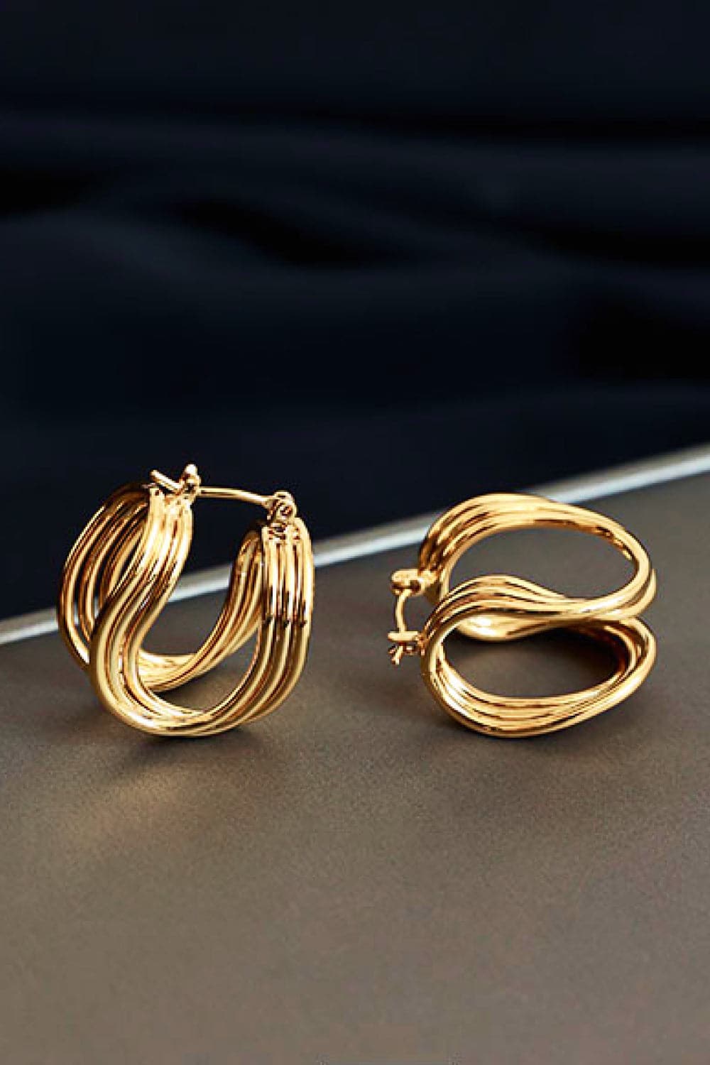 Modern brass u-shaped hoops