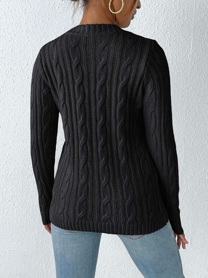 Cozy cable-knit long sleeve sweater with round neckline