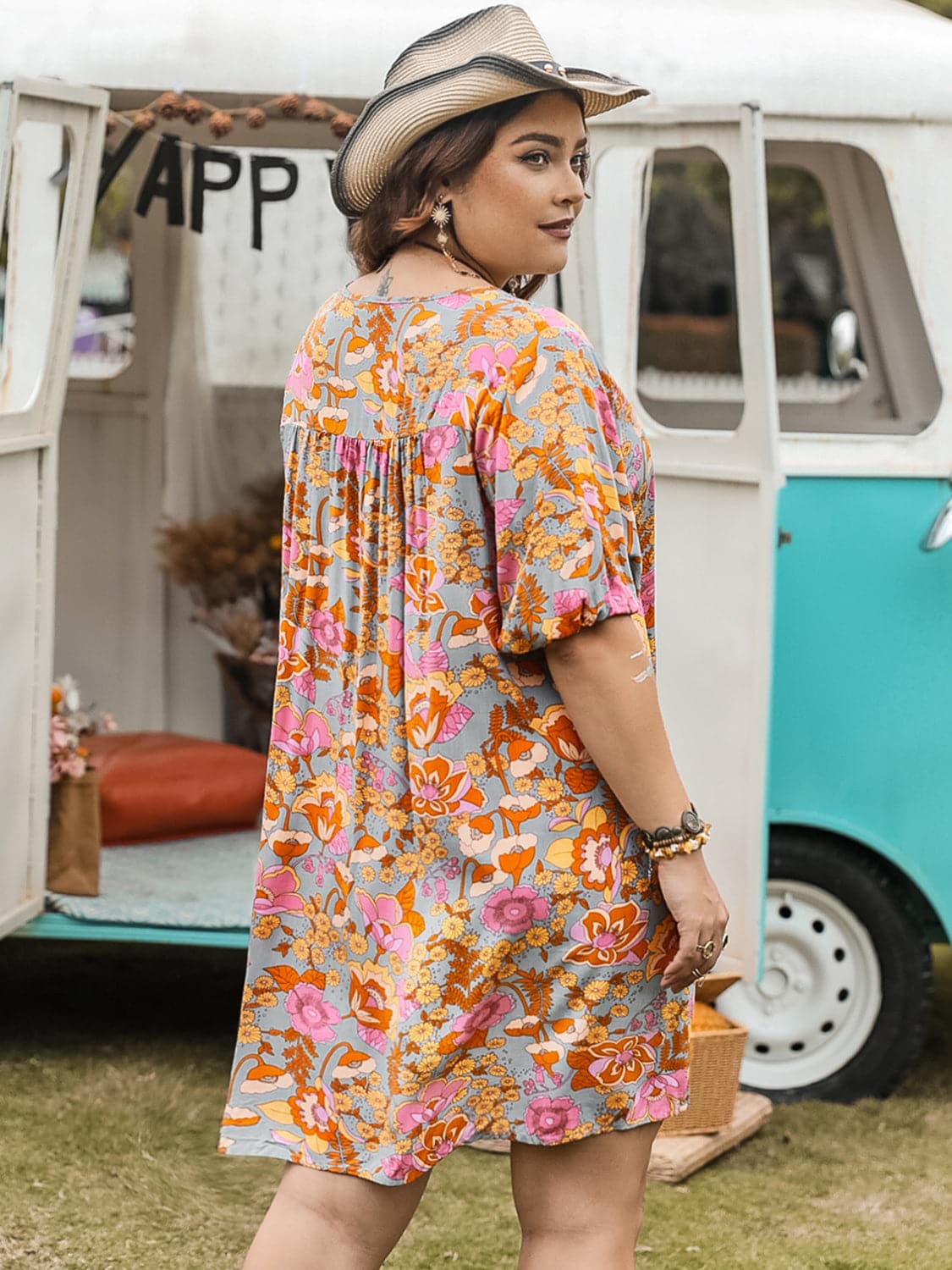 Plus Size Ruched Printed Half Sleeve Mini Dress.