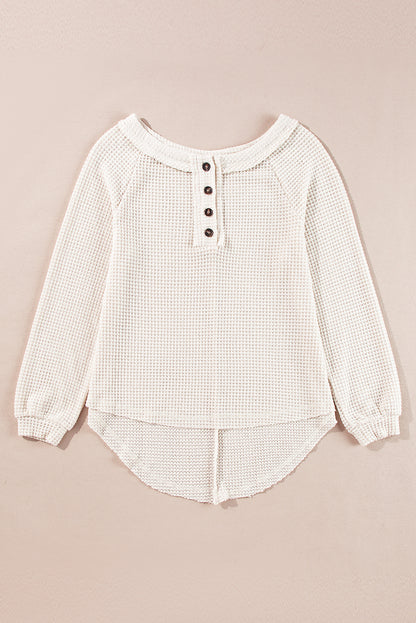 Cozy oatmeal waffle knit blouse with buttoned front and raglan sleeves