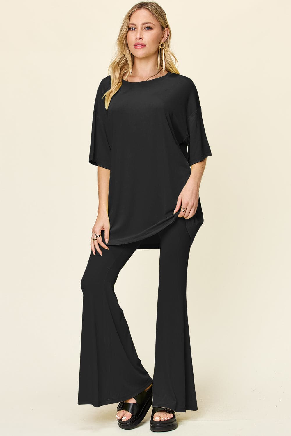 Double Take Full Size Round Neck Drop Shoulder T-Shirt and Flare Pants Set.