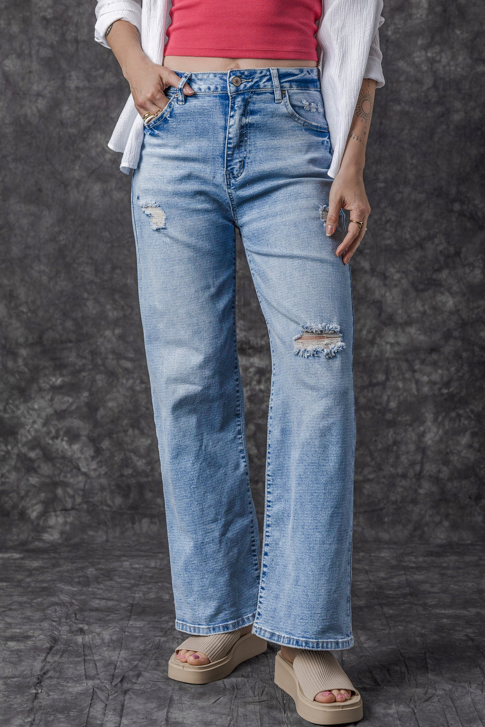 Chic light blue high rise distressed straight-leg denim