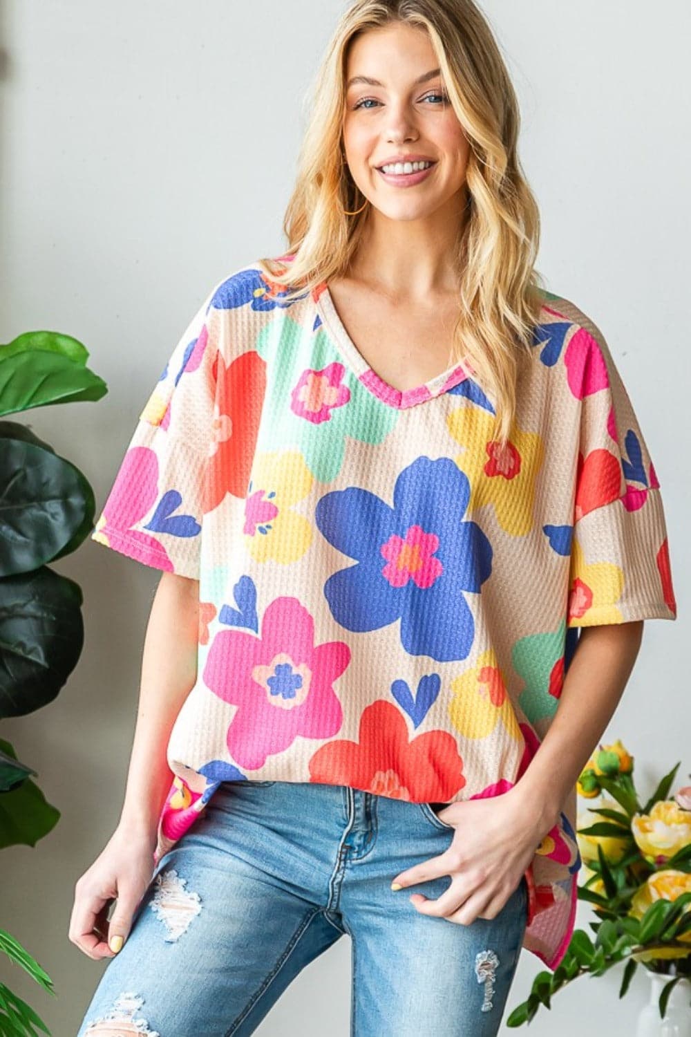 HOPELY Full Size Floral V-Neck Side Slit T-Shirt.