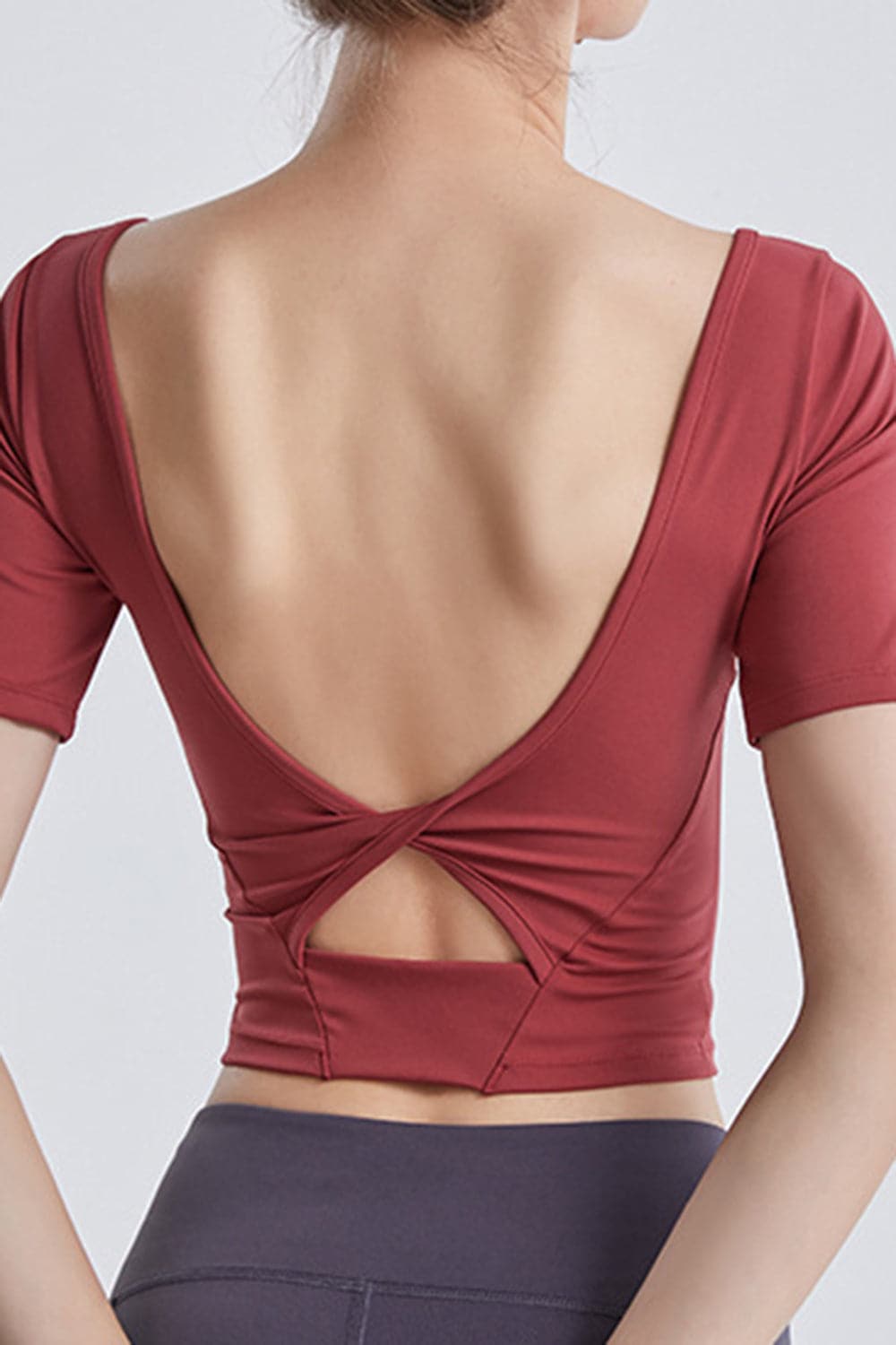 Cutout Backless Round Neck Active T-Shirt.