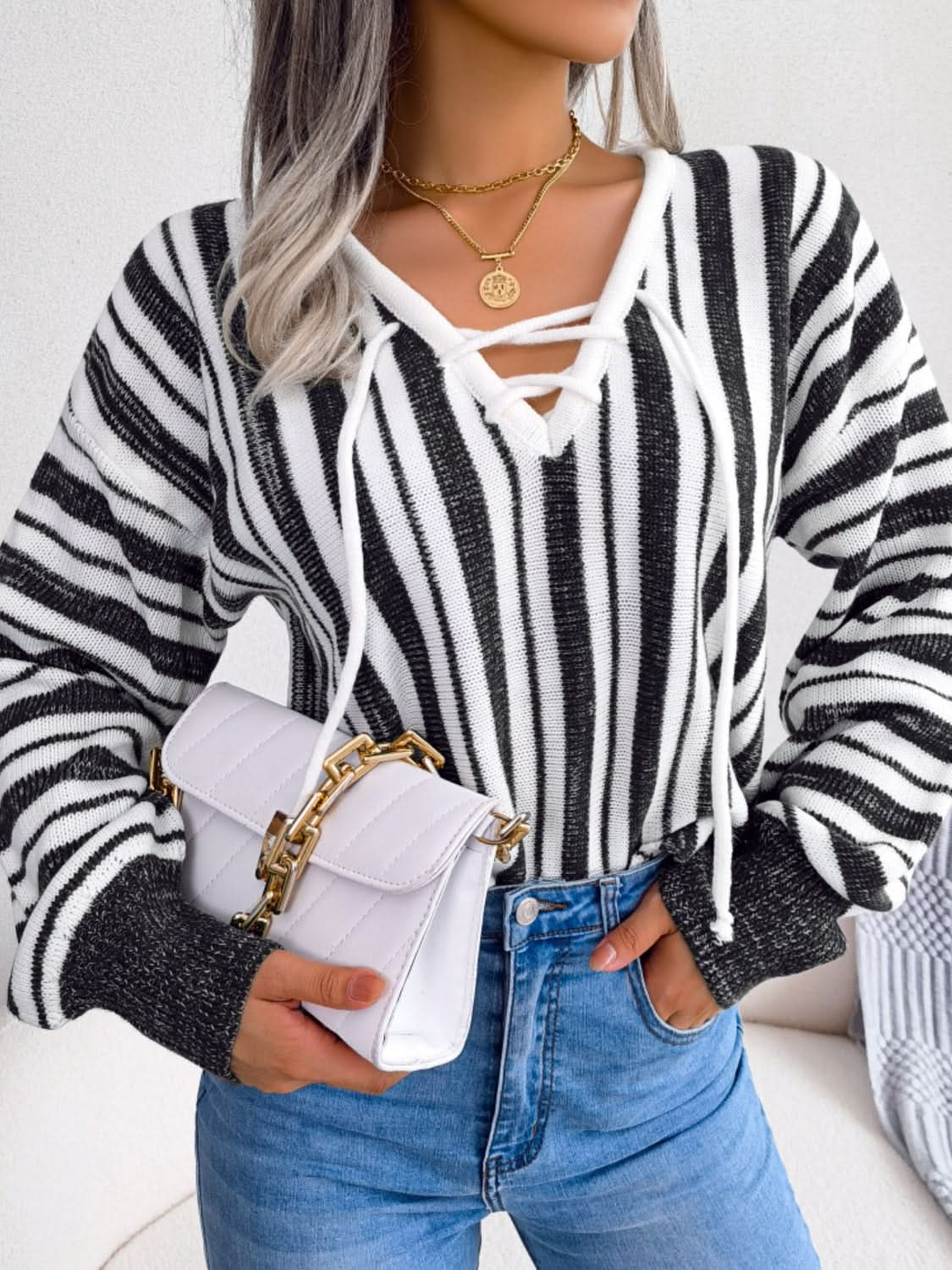 Lace-up striped long sleeve sweater