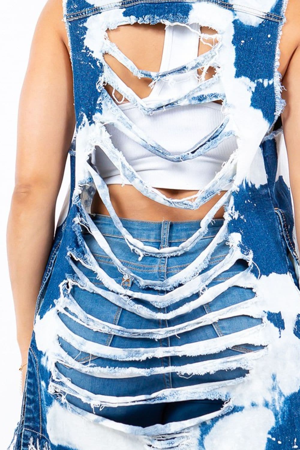 Distressed longline denim vest with frayed edges