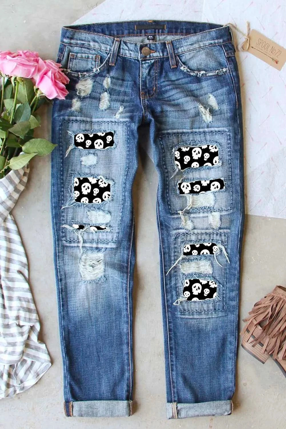 Distressed Skeleton Pattern Jeans with PocketsFeatures: Distressed
Stretch: Slightly stretchy
Material composition: 75% cotton, 24% polyester, 1% elastane
Care instructions: Machine wash cold. Tumble dry low.
ImLove Salve Distressed Skeleton Pattern JeansJeans