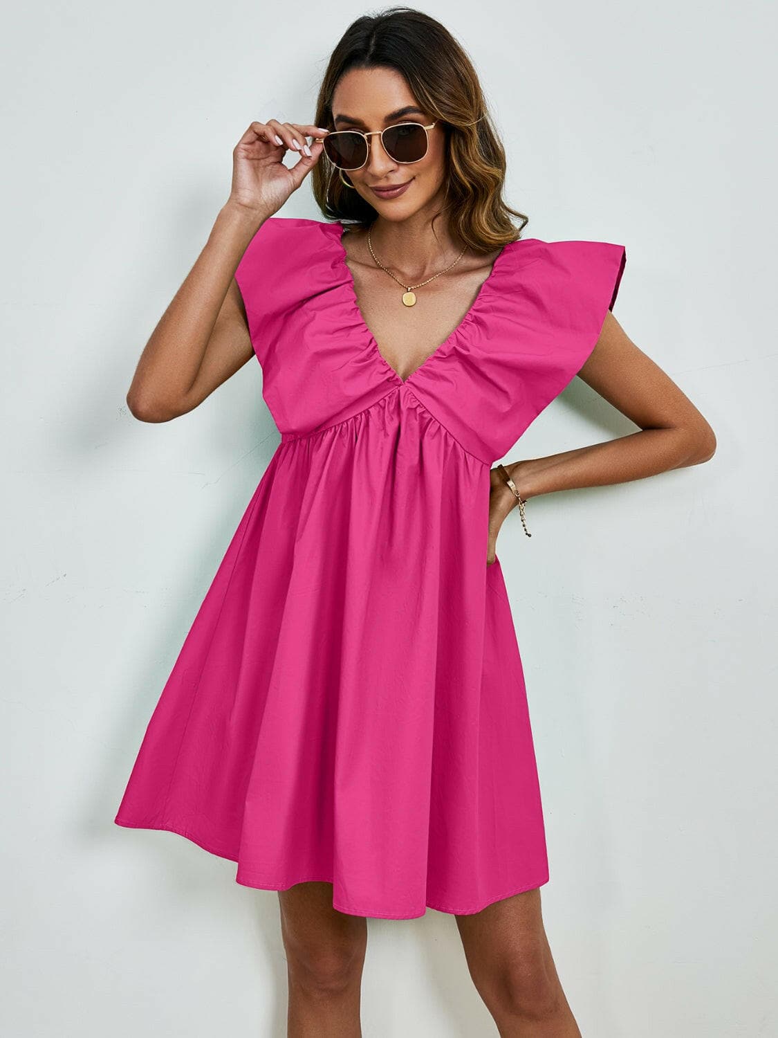 V-Neck Cap Sleeve Mini DressUpgrade Your Style with Our V-Neck Cap Sleeve Mini Dress
 Step out in confidence and elegance with our V-Neck Cap Sleeve Mini Dress, a versatile piece that effortlesLove Salve -Neck Cap Sleeve Mini Dress