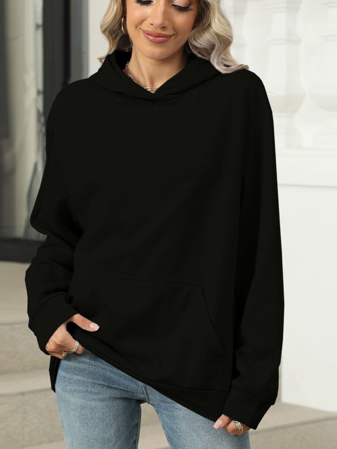 Sheer pocketed long sleeve hoodie with a cozy fit