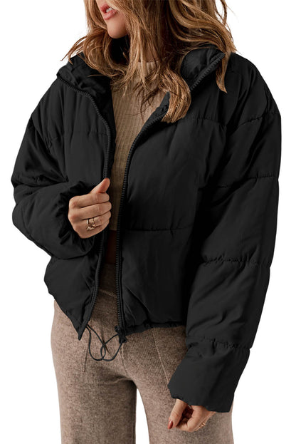 Sleek black puffer coat with zip closure and drawstring hem