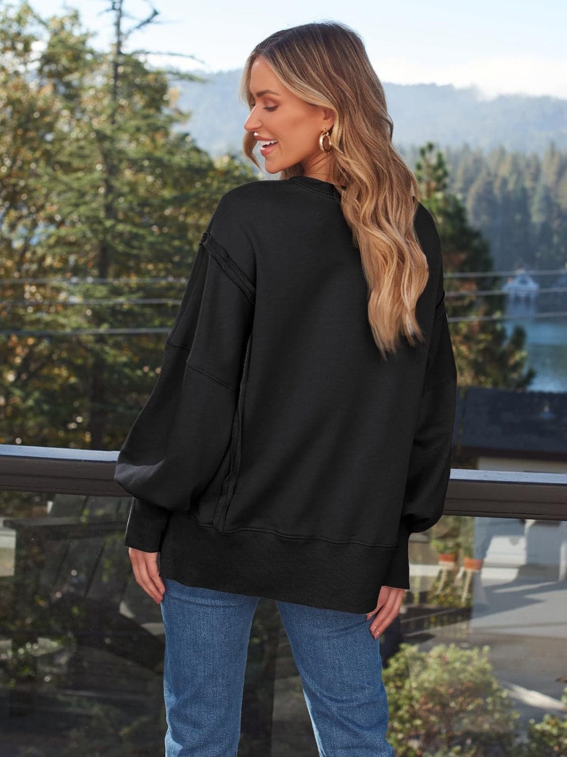 Slit Round Neck Long Sleeve Sweatshirt.