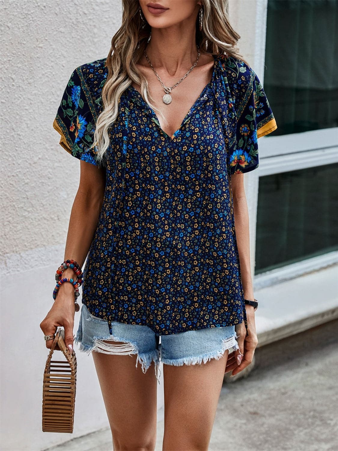 Tied Printed Short Sleeve Blouse.