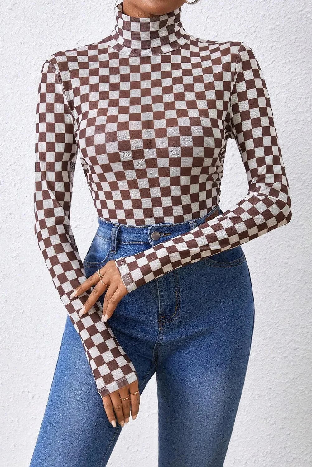 Checkered Turtleneck Long Sleeve BodysuitFeatures: Basic style
Sheer: Opaque
Stretch: Slightly stretchy
Material composition: 95% polyester, 5% elastane
Care instructions: Machine wash cold. Tumble dry low.Love Salve Checkered Turtleneck Long Sleeve BodysuitBodysuits