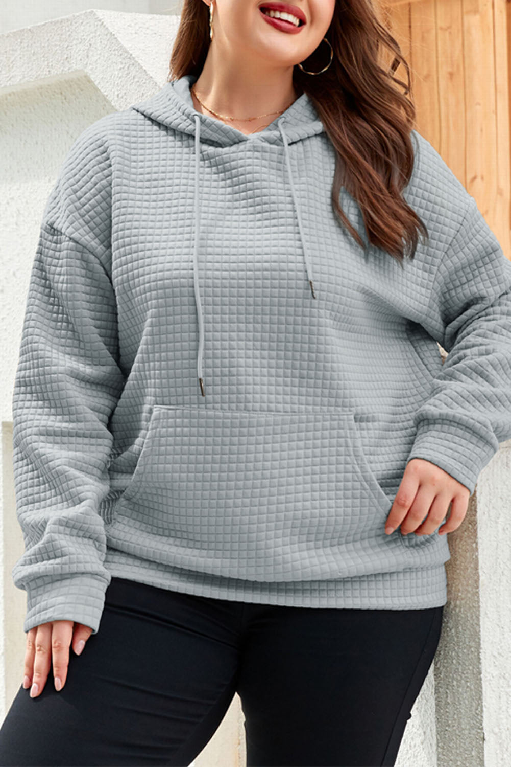 Cozy quilted gray hoodie with kangaroo pockets in plus sizes