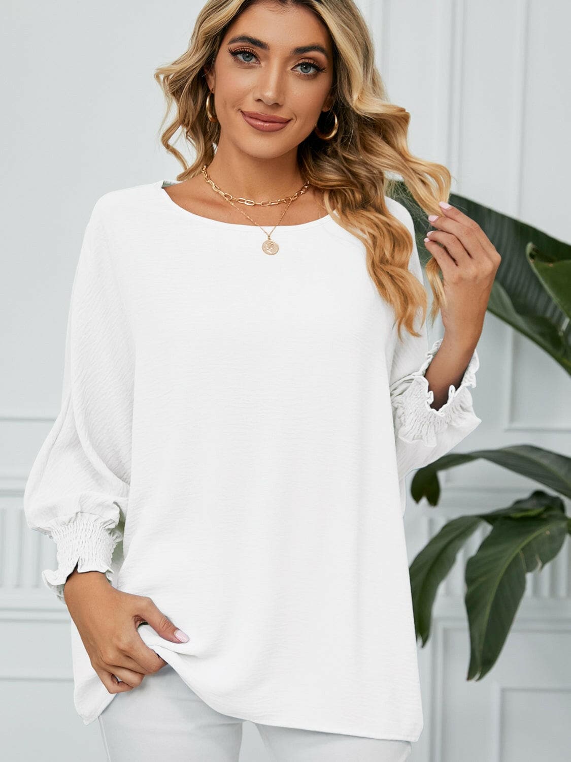 Smocked Lantern Sleeve Round Neck Blouse.