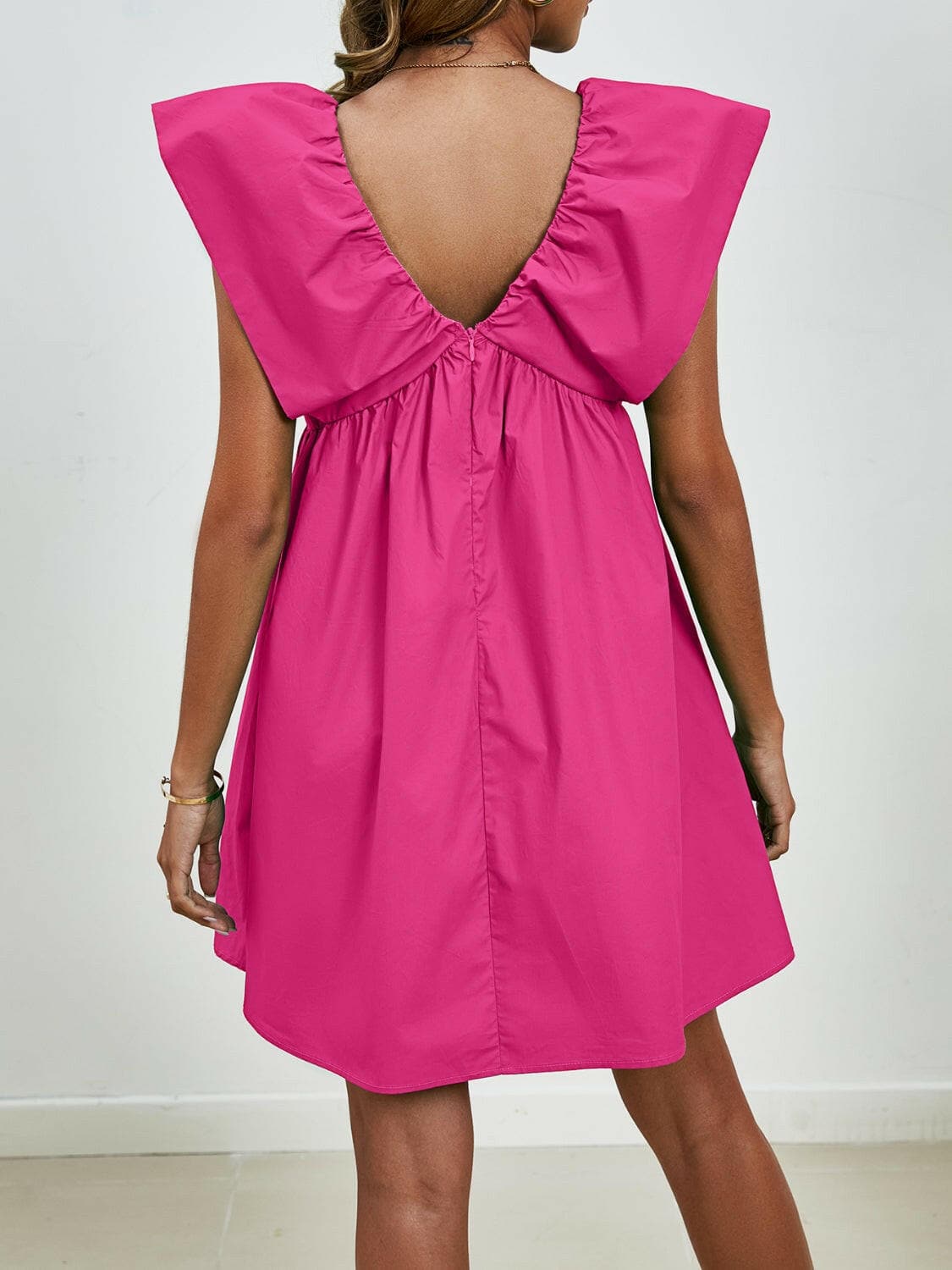 V-Neck Cap Sleeve Mini DressUpgrade Your Style with Our V-Neck Cap Sleeve Mini Dress
 Step out in confidence and elegance with our V-Neck Cap Sleeve Mini Dress, a versatile piece that effortlesLove Salve -Neck Cap Sleeve Mini Dress