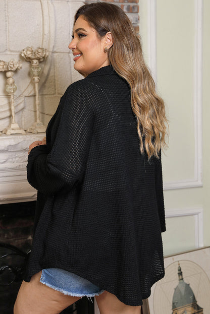 Chic black plus size pocketed waffle knit top