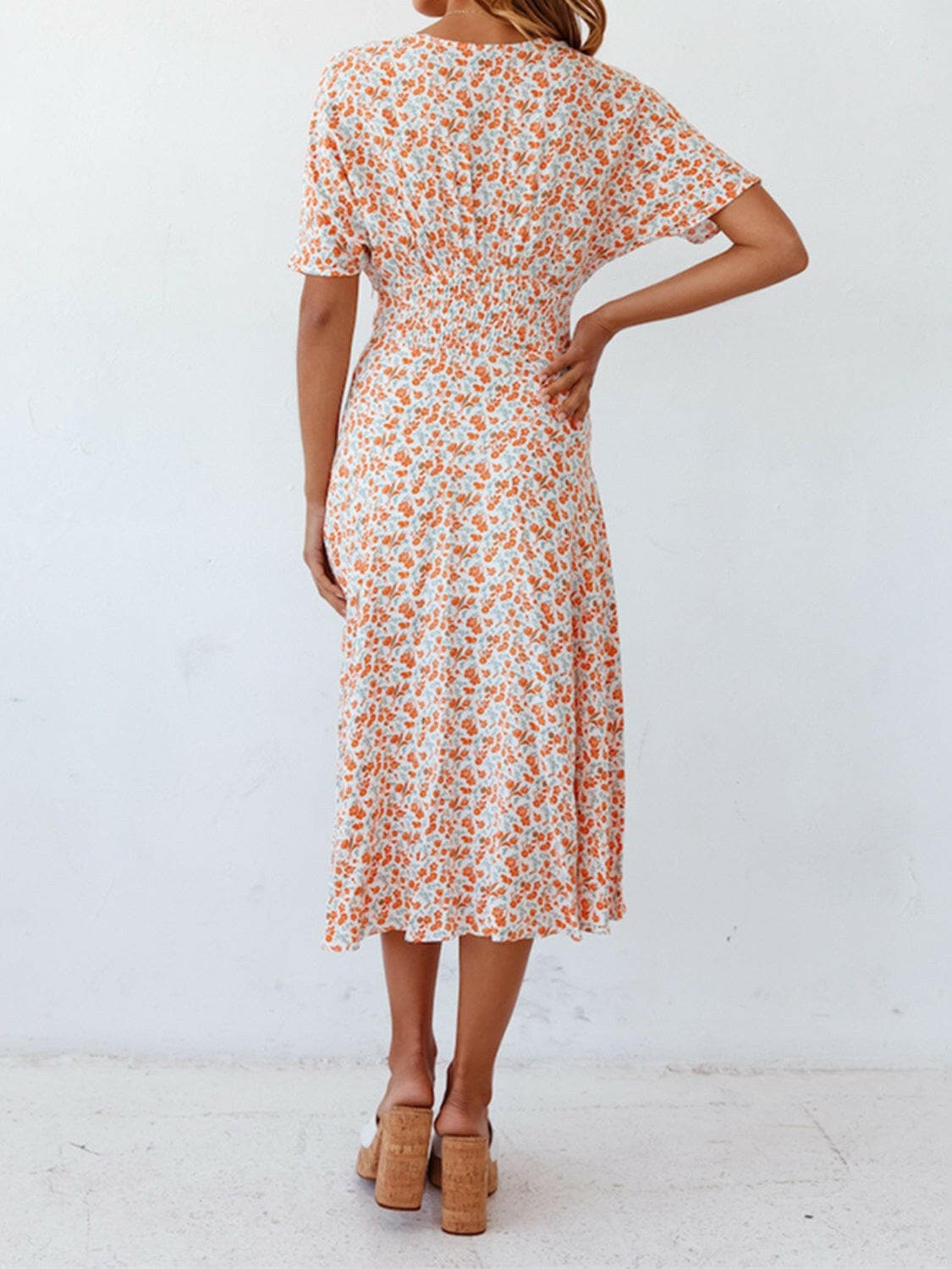 Ditsy Floral V-Neck Short Sleeve Midi DressDitsy Floral V-Neck Short Sleeve Midi Dress
 Embrace your femininity with the timeless elegance of the Ditsy Floral V-Neck Short Sleeve Midi Dress.
 Main Features:
 Love Salve -Neck Short Sleeve Midi Dressswimwear