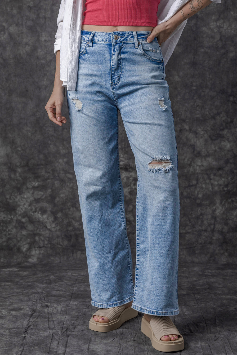 Chic light blue high rise distressed straight-leg denim